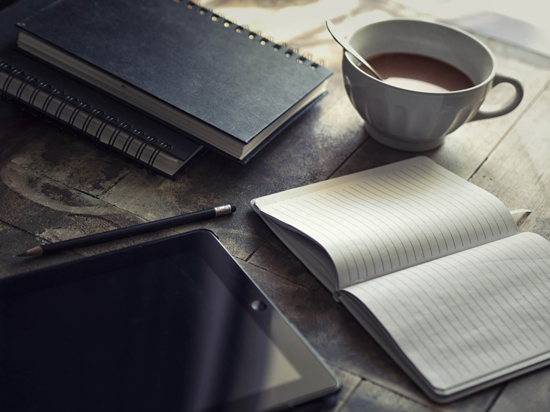 Drinking from a coffee cup when writing a literary essay based on a book